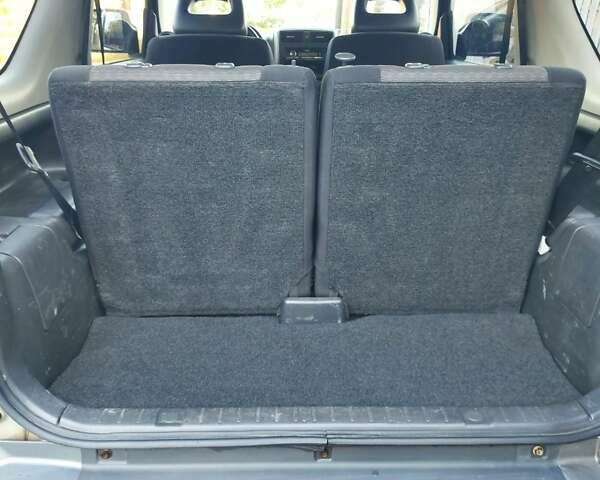 Бежевий Сузукі Джімні, об'ємом двигуна 1.6 л та пробігом 186 тис. км за 9200 $, фото 6 на Automoto.ua