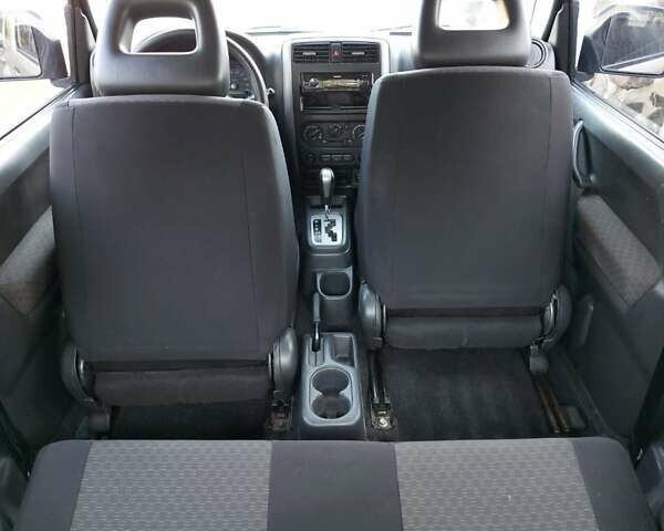 Бежевий Сузукі Джімні, об'ємом двигуна 1.6 л та пробігом 186 тис. км за 9200 $, фото 16 на Automoto.ua