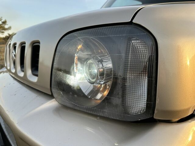 Бежевий Сузукі Джімні, об'ємом двигуна 1.3 л та пробігом 150 тис. км за 8700 $, фото 21 на Automoto.ua