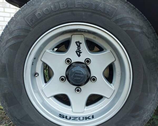 Бежевий Сузукі Джімні, об'ємом двигуна 1.6 л та пробігом 186 тис. км за 9200 $, фото 14 на Automoto.ua