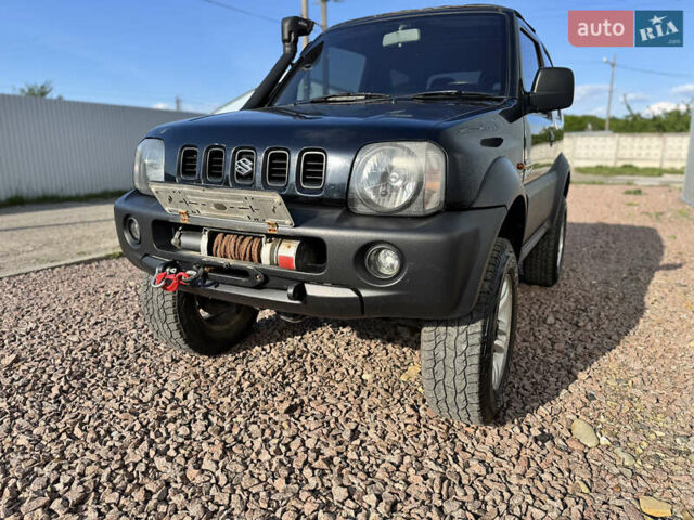 Черный Сузуки Джимни, объемом двигателя 1.3 л и пробегом 100 тыс. км за 7200 $, фото 3 на Automoto.ua