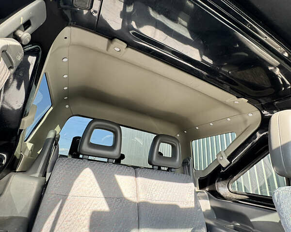 Черный Сузуки Джимни, объемом двигателя 1.3 л и пробегом 100 тыс. км за 7200 $, фото 20 на Automoto.ua