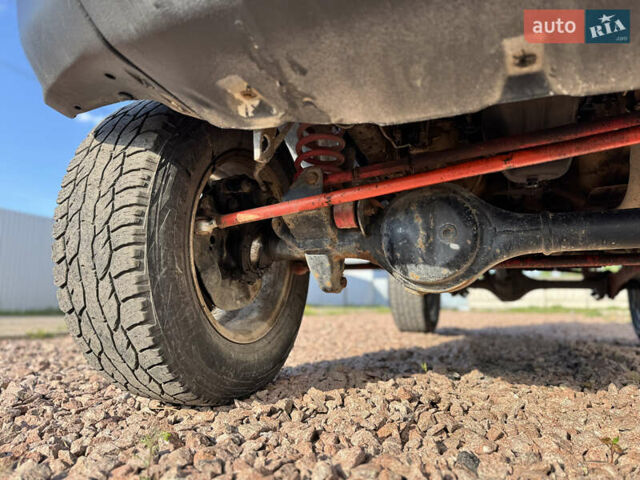 Черный Сузуки Джимни, объемом двигателя 1.3 л и пробегом 100 тыс. км за 7200 $, фото 10 на Automoto.ua