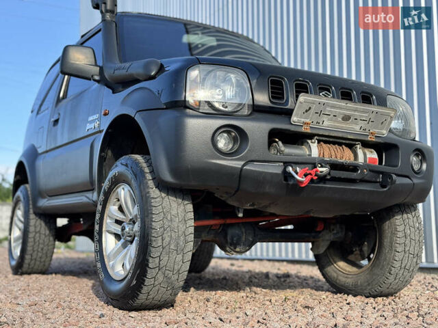Черный Сузуки Джимни, объемом двигателя 1.3 л и пробегом 100 тыс. км за 7200 $, фото 4 на Automoto.ua