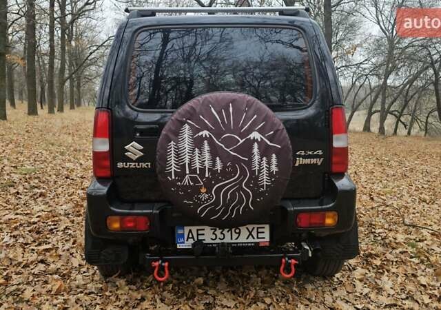 Черный Сузуки Джимни, объемом двигателя 1.33 л и пробегом 148 тыс. км за 8500 $, фото 5 на Automoto.ua