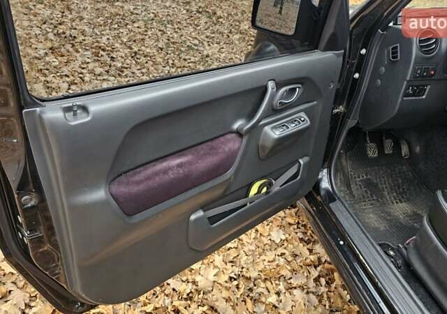 Черный Сузуки Джимни, объемом двигателя 1.33 л и пробегом 148 тыс. км за 8500 $, фото 21 на Automoto.ua