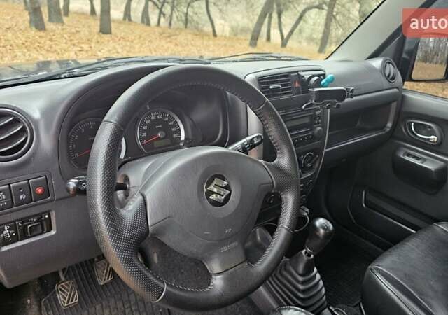 Черный Сузуки Джимни, объемом двигателя 1.33 л и пробегом 148 тыс. км за 8500 $, фото 15 на Automoto.ua