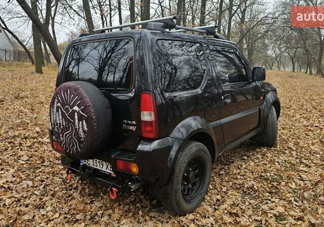 Черный Сузуки Джимни, объемом двигателя 1.33 л и пробегом 148 тыс. км за 8500 $, фото 8 на Automoto.ua