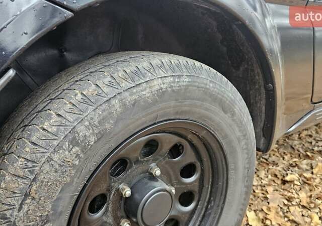 Черный Сузуки Джимни, объемом двигателя 1.33 л и пробегом 148 тыс. км за 8500 $, фото 13 на Automoto.ua