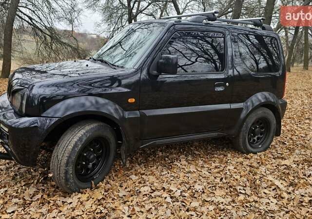 Черный Сузуки Джимни, объемом двигателя 1.33 л и пробегом 148 тыс. км за 8500 $, фото 9 на Automoto.ua
