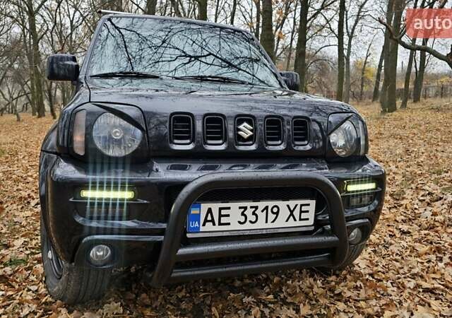 Черный Сузуки Джимни, объемом двигателя 1.33 л и пробегом 148 тыс. км за 8500 $, фото 3 на Automoto.ua