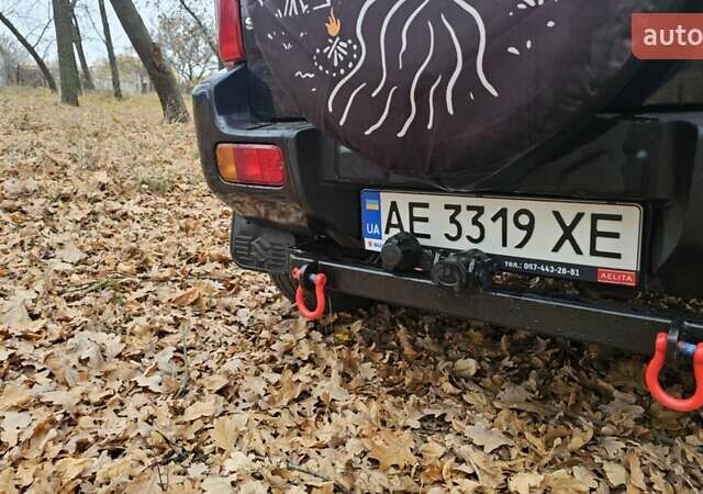 Черный Сузуки Джимни, объемом двигателя 1.33 л и пробегом 148 тыс. км за 8500 $, фото 4 на Automoto.ua