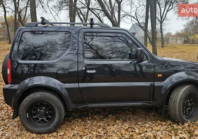 Черный Сузуки Джимни, объемом двигателя 1.33 л и пробегом 148 тыс. км за 8500 $, фото 1 на Automoto.ua