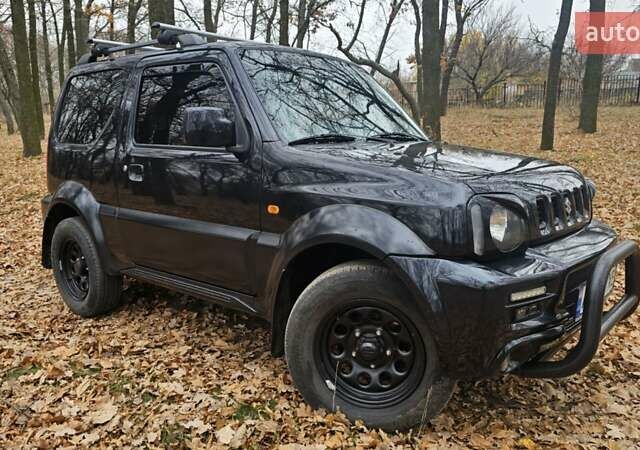 Черный Сузуки Джимни, объемом двигателя 1.33 л и пробегом 148 тыс. км за 8500 $, фото 6 на Automoto.ua
