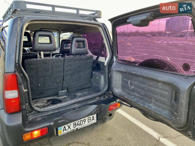 Черный Сузуки Джимни, объемом двигателя 1.33 л и пробегом 292 тыс. км за 5000 $, фото 8 на Automoto.ua