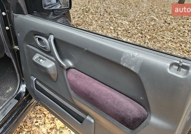 Черный Сузуки Джимни, объемом двигателя 1.33 л и пробегом 148 тыс. км за 8500 $, фото 19 на Automoto.ua