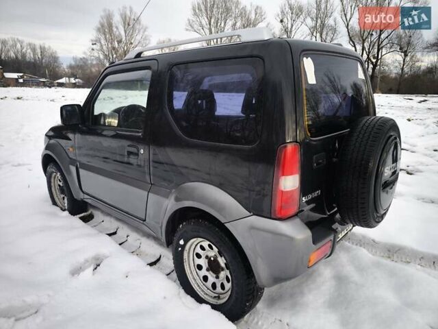 Чорний Сузукі Джімні, об'ємом двигуна 1.3 л та пробігом 163 тис. км за 7700 $, фото 11 на Automoto.ua