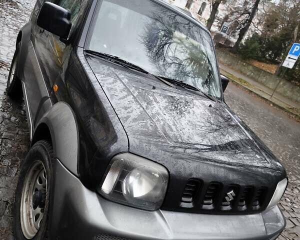 Чорний Сузукі Джімні, об'ємом двигуна 1.3 л та пробігом 164 тис. км за 7450 $, фото 2 на Automoto.ua