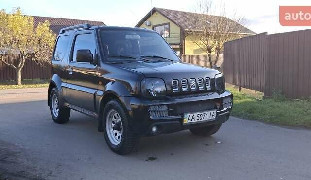 Черный Сузуки Джимни, объемом двигателя 1.3 л и пробегом 225 тыс. км за 6500 $, фото 3 на Automoto.ua