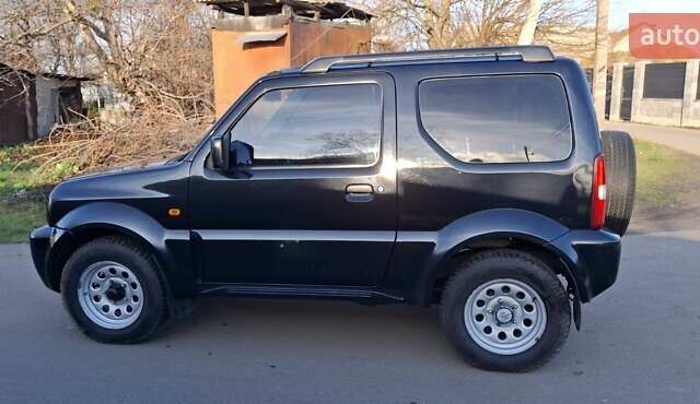 Черный Сузуки Джимни, объемом двигателя 1.3 л и пробегом 225 тыс. км за 6500 $, фото 9 на Automoto.ua