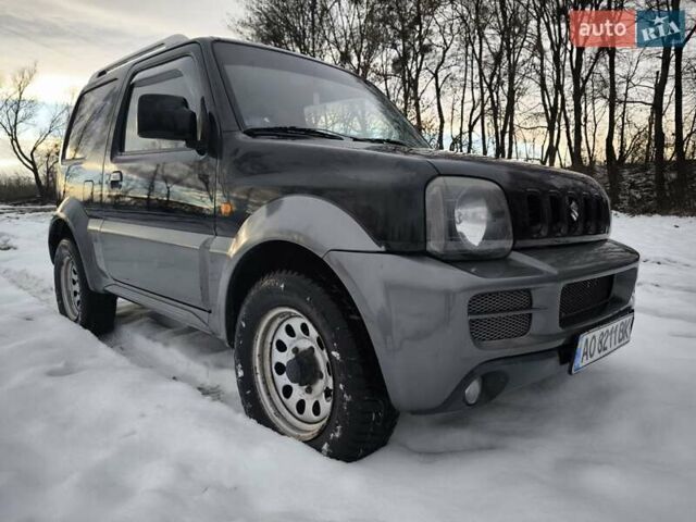 Чорний Сузукі Джімні, об'ємом двигуна 1.3 л та пробігом 163 тис. км за 7700 $, фото 6 на Automoto.ua