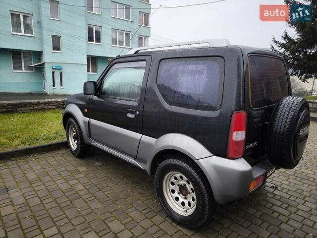 Чорний Сузукі Джімні, об'ємом двигуна 1.3 л та пробігом 164 тис. км за 7450 $, фото 11 на Automoto.ua