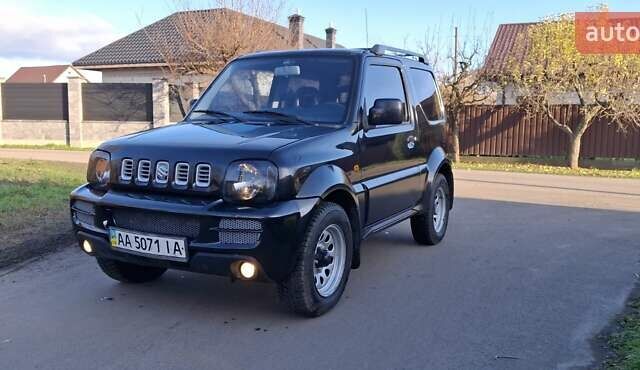 Черный Сузуки Джимни, объемом двигателя 1.3 л и пробегом 225 тыс. км за 6500 $, фото 4 на Automoto.ua