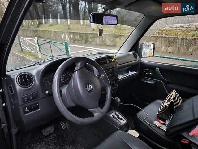 Чорний Сузукі Джімні, об'ємом двигуна 1.3 л та пробігом 164 тис. км за 7450 $, фото 5 на Automoto.ua