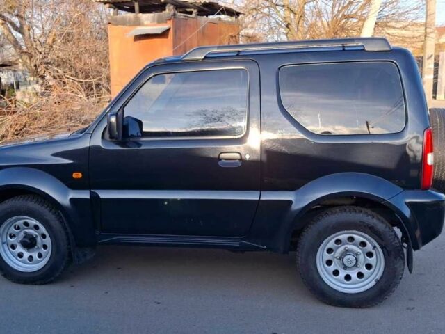 Черный Сузуки Джимни, объемом двигателя 1.3 л и пробегом 225 тыс. км за 6500 $, фото 9 на Automoto.ua