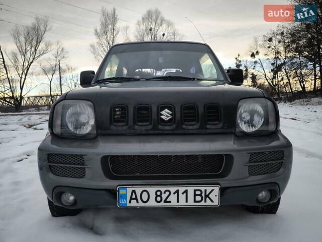 Чорний Сузукі Джімні, об'ємом двигуна 1.3 л та пробігом 163 тис. км за 7700 $, фото 4 на Automoto.ua
