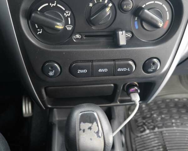 Чорний Сузукі Джімні, об'ємом двигуна 1.3 л та пробігом 163 тис. км за 7700 $, фото 14 на Automoto.ua