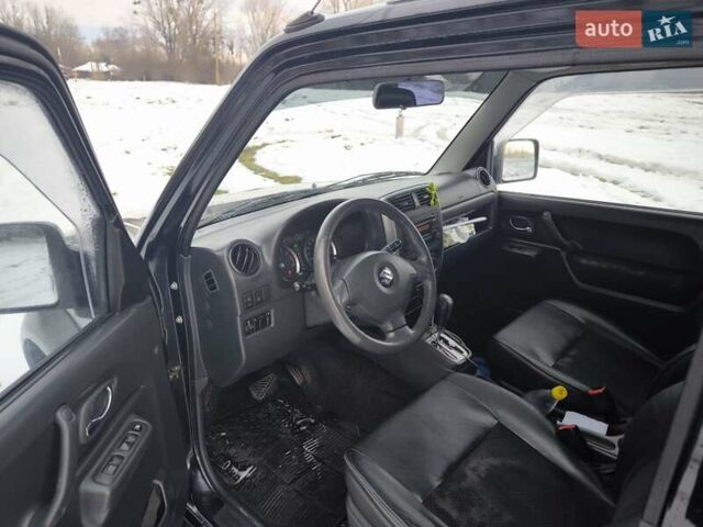 Чорний Сузукі Джімні, об'ємом двигуна 1.3 л та пробігом 163 тис. км за 7700 $, фото 13 на Automoto.ua