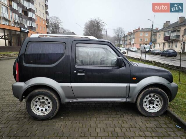Чорний Сузукі Джімні, об'ємом двигуна 1.3 л та пробігом 164 тис. км за 7450 $, фото 13 на Automoto.ua