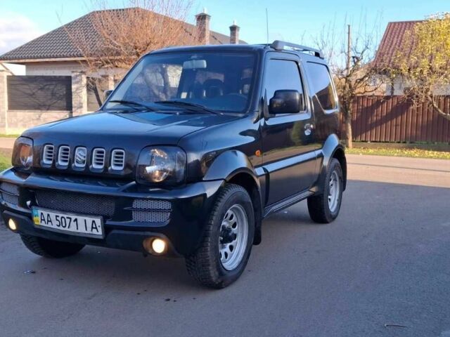 Черный Сузуки Джимни, объемом двигателя 1.3 л и пробегом 225 тыс. км за 6500 $, фото 4 на Automoto.ua