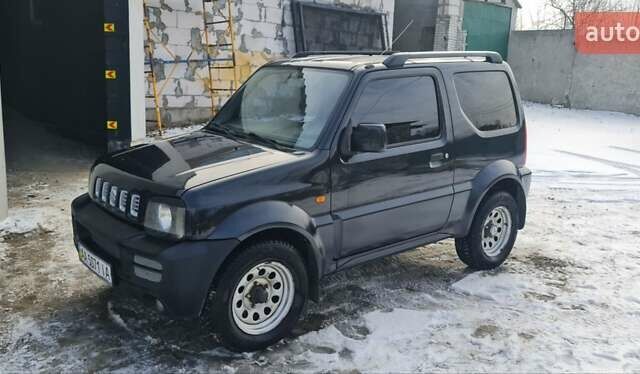 Чорний Сузукі Джімні, об'ємом двигуна 1.3 л та пробігом 224 тис. км за 7200 $, фото 9 на Automoto.ua
