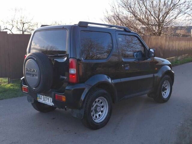 Черный Сузуки Джимни, объемом двигателя 1.3 л и пробегом 225 тыс. км за 6500 $, фото 6 на Automoto.ua