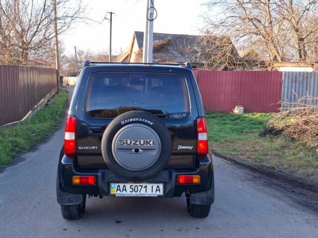 Черный Сузуки Джимни, объемом двигателя 1.3 л и пробегом 225 тыс. км за 6500 $, фото 7 на Automoto.ua