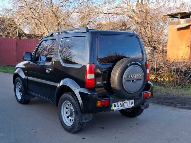 Черный Сузуки Джимни, объемом двигателя 1.3 л и пробегом 225 тыс. км за 6500 $, фото 8 на Automoto.ua