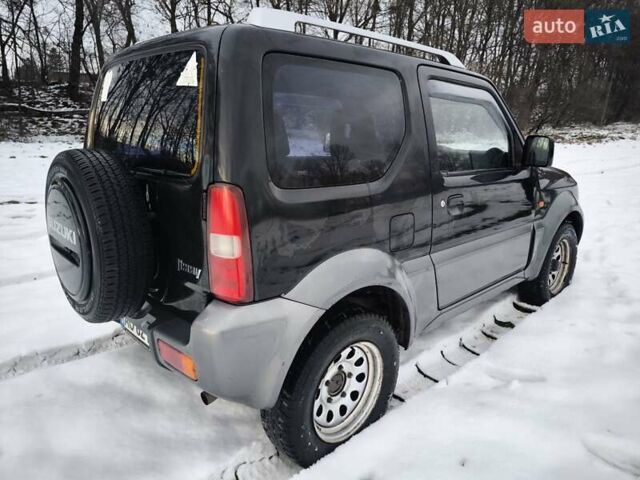 Чорний Сузукі Джімні, об'ємом двигуна 1.3 л та пробігом 163 тис. км за 7700 $, фото 8 на Automoto.ua