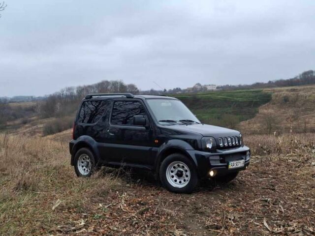 Черный Сузуки Джимни, объемом двигателя 1.3 л и пробегом 225 тыс. км за 6500 $, фото 1 на Automoto.ua