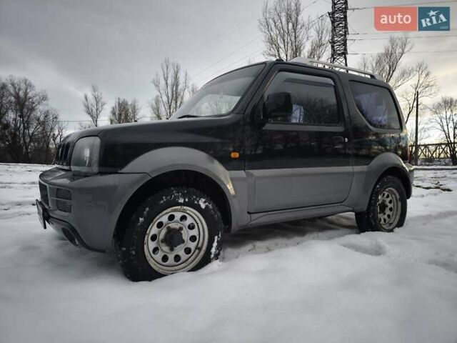 Чорний Сузукі Джімні, об'ємом двигуна 1.3 л та пробігом 163 тис. км за 7700 $, фото 1 на Automoto.ua