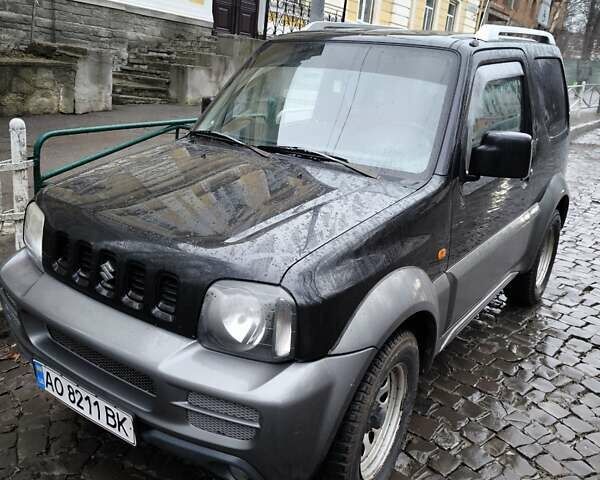 Чорний Сузукі Джімні, об'ємом двигуна 1.3 л та пробігом 164 тис. км за 7450 $, фото 1 на Automoto.ua