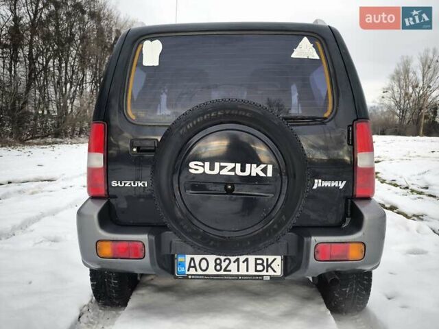 Чорний Сузукі Джімні, об'ємом двигуна 1.3 л та пробігом 163 тис. км за 7700 $, фото 9 на Automoto.ua