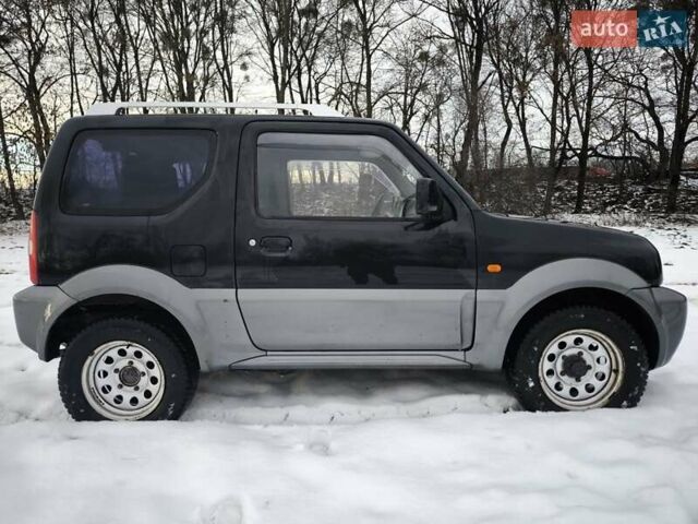Чорний Сузукі Джімні, об'ємом двигуна 1.3 л та пробігом 163 тис. км за 7700 $, фото 7 на Automoto.ua