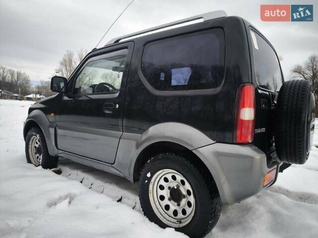 Чорний Сузукі Джімні, об'ємом двигуна 1.3 л та пробігом 163 тис. км за 7700 $, фото 10 на Automoto.ua
