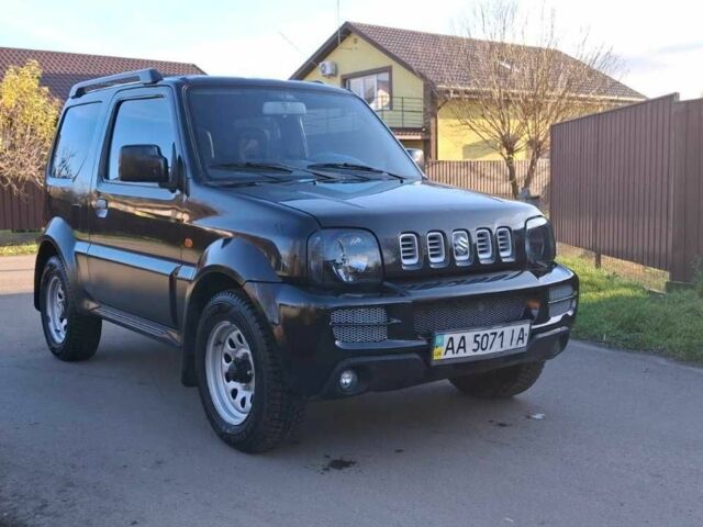 Черный Сузуки Джимни, объемом двигателя 1.3 л и пробегом 225 тыс. км за 6500 $, фото 2 на Automoto.ua