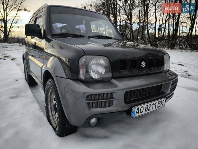 Чорний Сузукі Джімні, об'ємом двигуна 1.3 л та пробігом 163 тис. км за 7700 $, фото 5 на Automoto.ua
