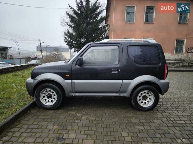 Чорний Сузукі Джімні, об'ємом двигуна 1.3 л та пробігом 164 тис. км за 7450 $, фото 10 на Automoto.ua