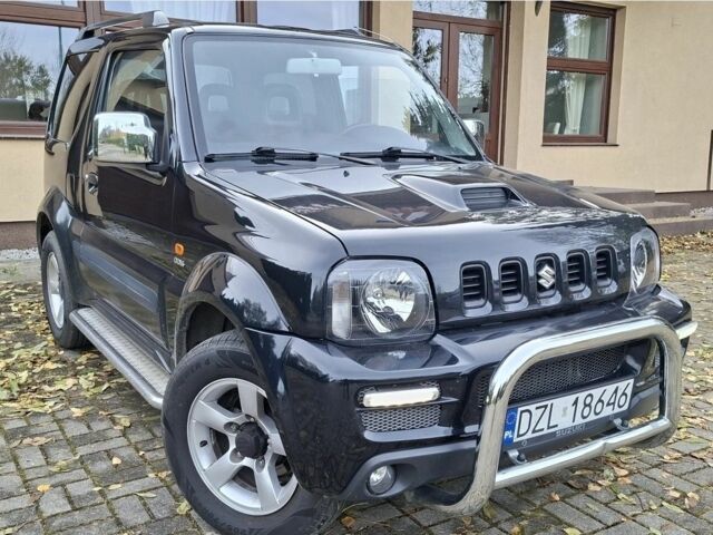 Черный Сузуки Джимни, объемом двигателя 1.5 л и пробегом 130 тыс. км за 1699 $, фото 4 на Automoto.ua