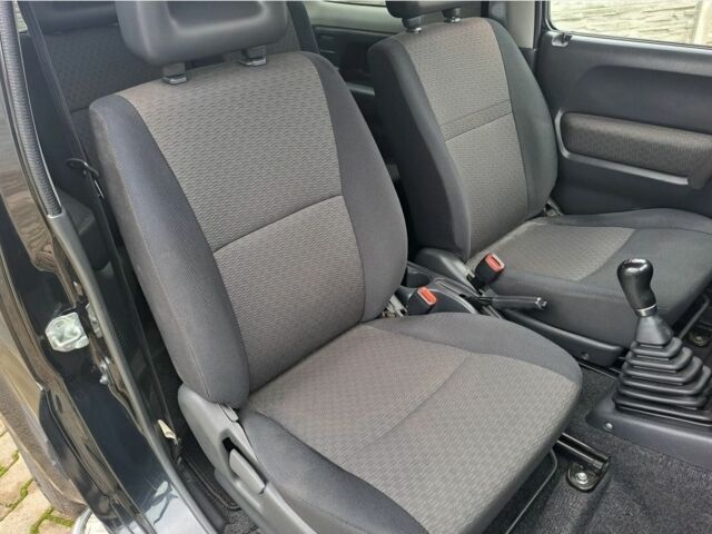 Черный Сузуки Джимни, объемом двигателя 1.5 л и пробегом 130 тыс. км за 1699 $, фото 9 на Automoto.ua